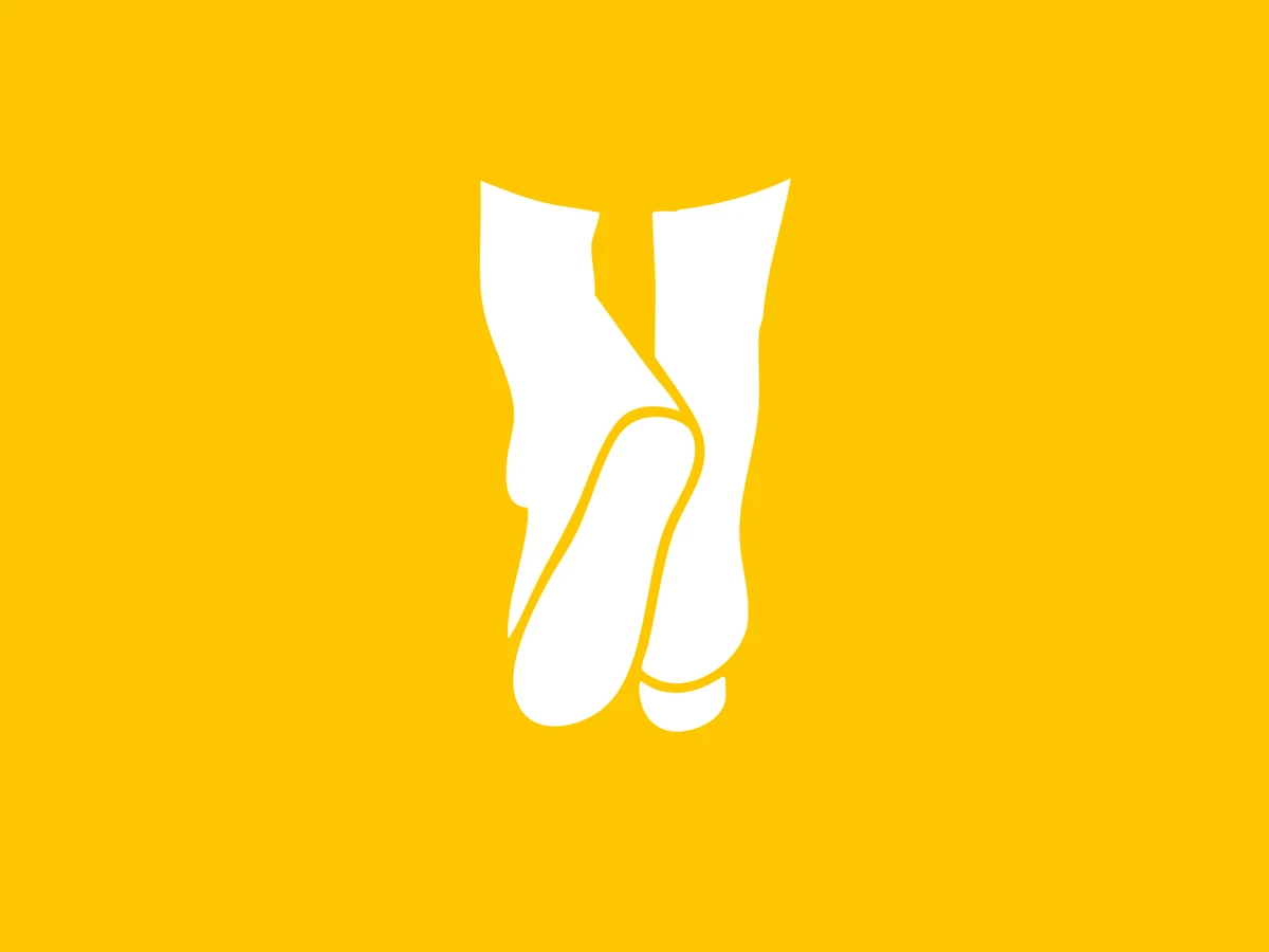 The Walking Project logo: white walking feet on a marigold yellow ground