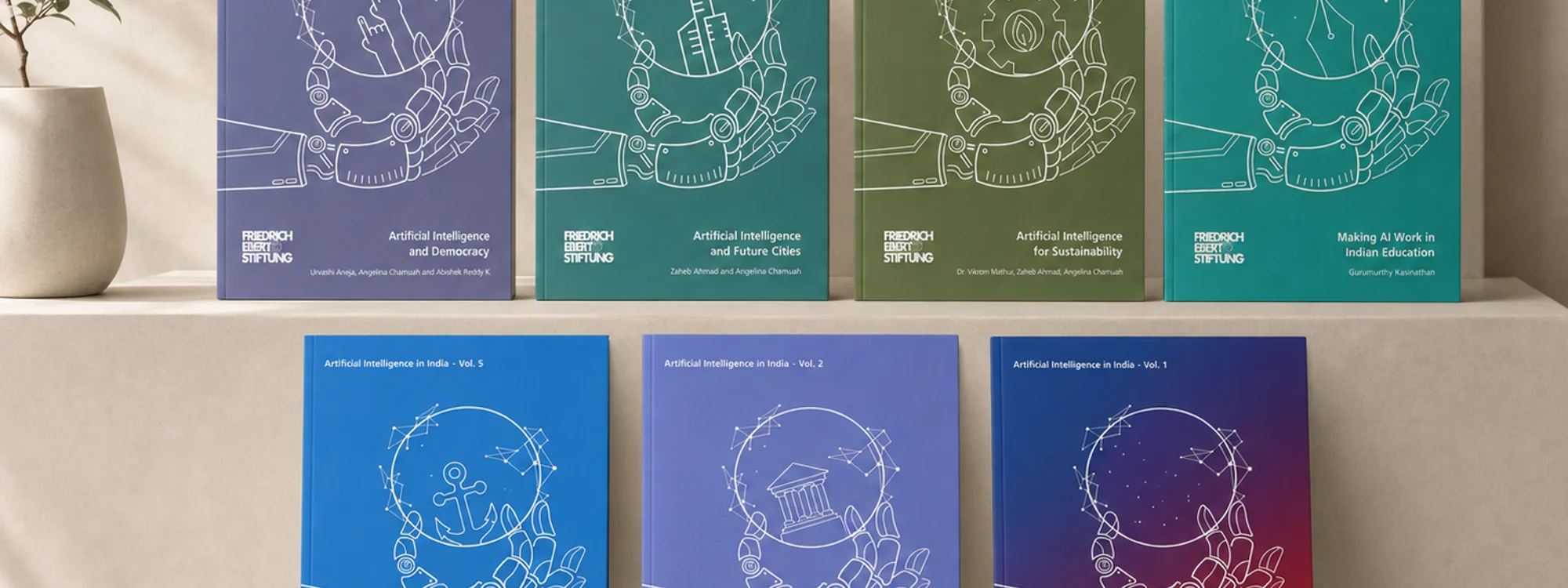 Seven covers from the Artificial Intelligence in India series for Friedrich Ebert Stiftung, each a robotic hand holding a sphere with the volume's own icon