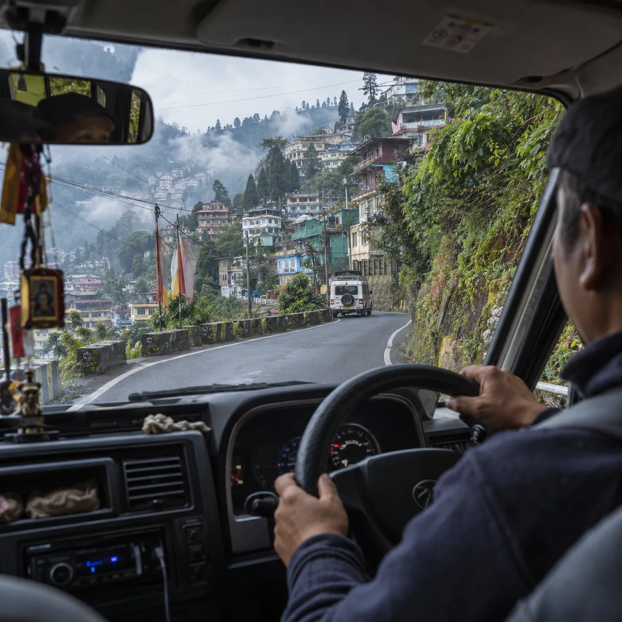 A taxi on a hill road